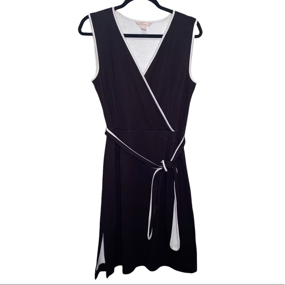 Banana Republic Dresses & Skirts - Banana Republic fully lined midi faux wrap black dress w/white lining.